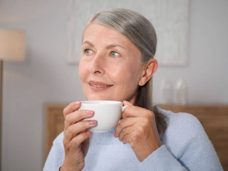older adult enjoying peaceful moment at home with support from concierge senior living services