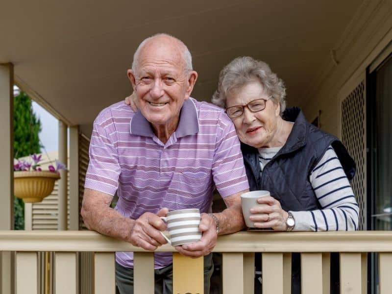 senior couple settling into new home with guidance from senior living transition support
