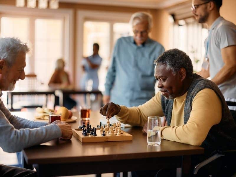 assisted living placement help supporting seniors enjoying social activities in community setting